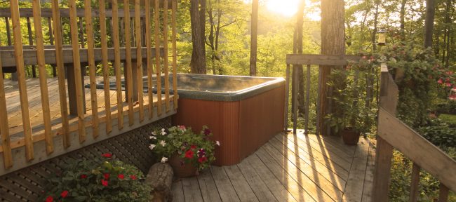 Surround your hot tub with a custom deck or patio